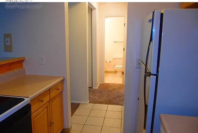Looking from kitchen to bath
