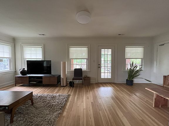 New roller shades throughout apartment stay with the apartment.