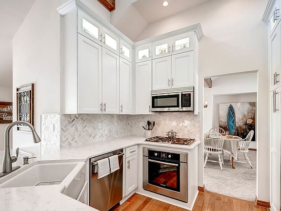Kitchen has vaulted ceiling