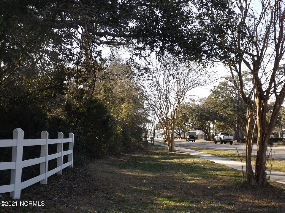 1st image of 6607 E Oak Island Drive LOT 1.87 Acre