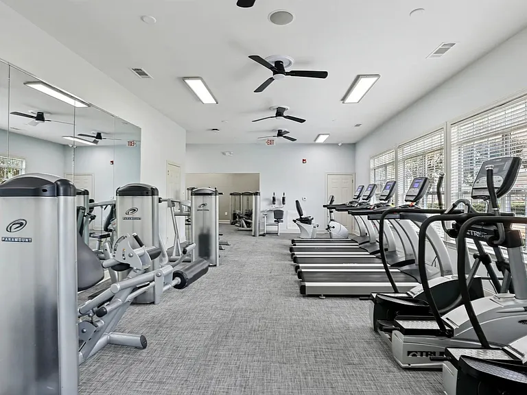 A 24-hour fitness center with treadmills and exercise equipment.