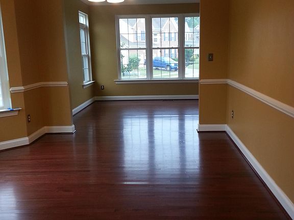 Dining Room photo opening to the den. Picture is from the ki