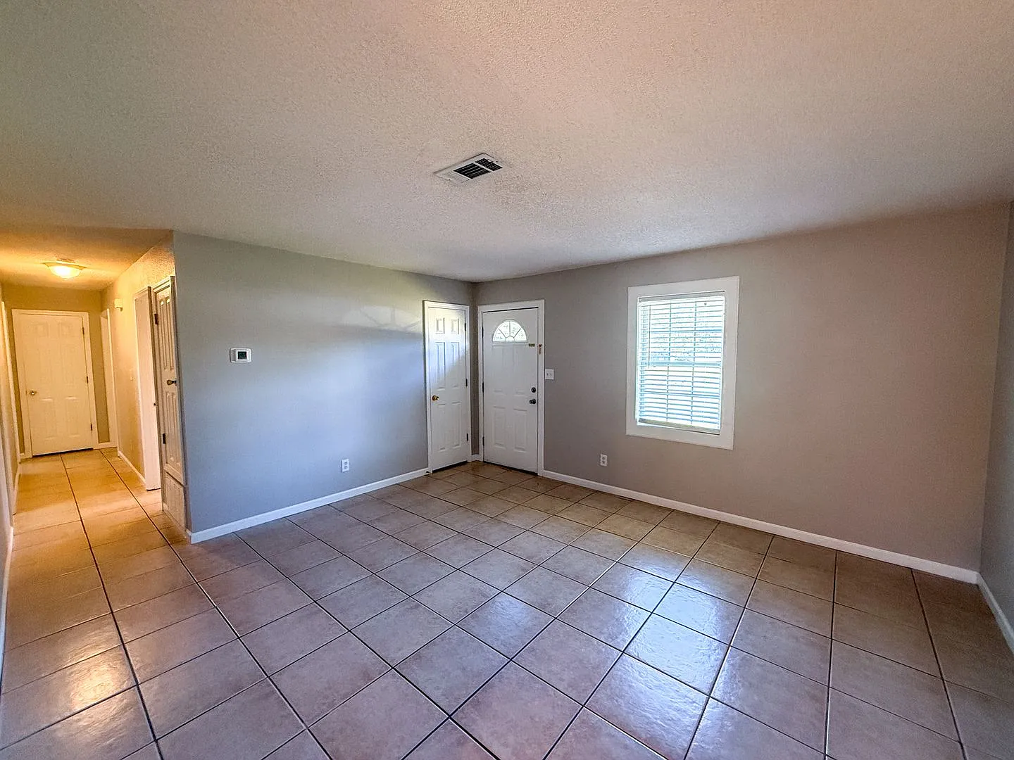 3 Bedroom Home with Fenced Backyard in Pace For Rent! — Photo 2