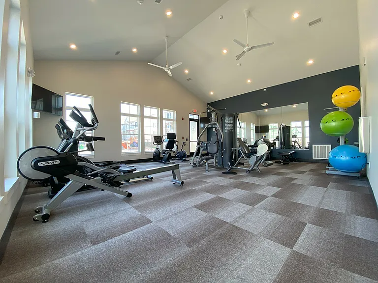 A clean, modern space with everything you need for a solid workout just steps from your front door.