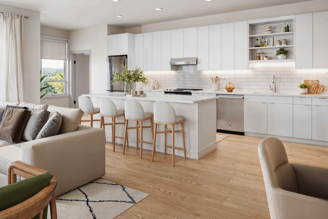 Kitchen with Stainless Steel Appliances and Breakfast Bar