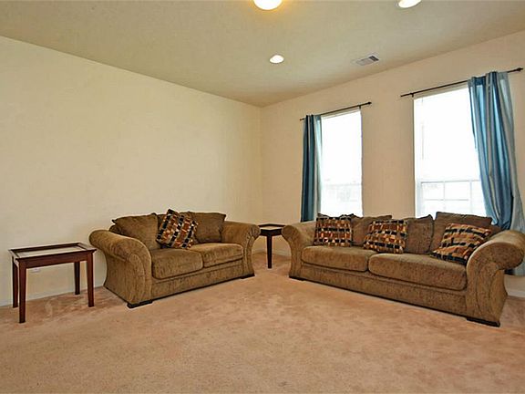 This large room downstairs can be used as a study, gameroom, media room or formal living
