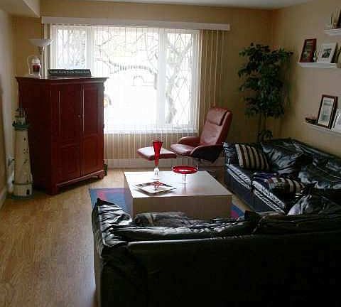 Living Room, Wood Floors, New Windows, Open Concept