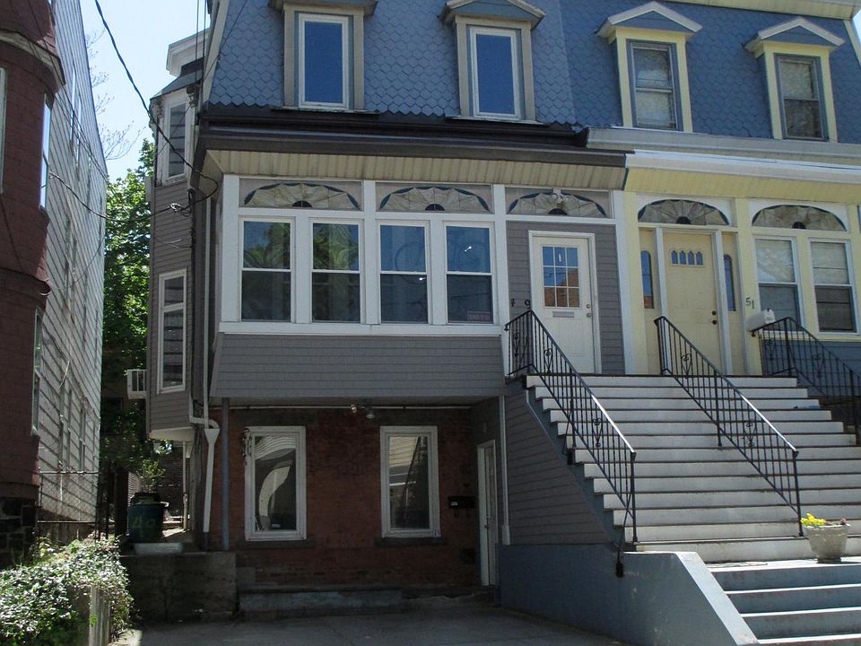 One parking spot for a compact car included in rent