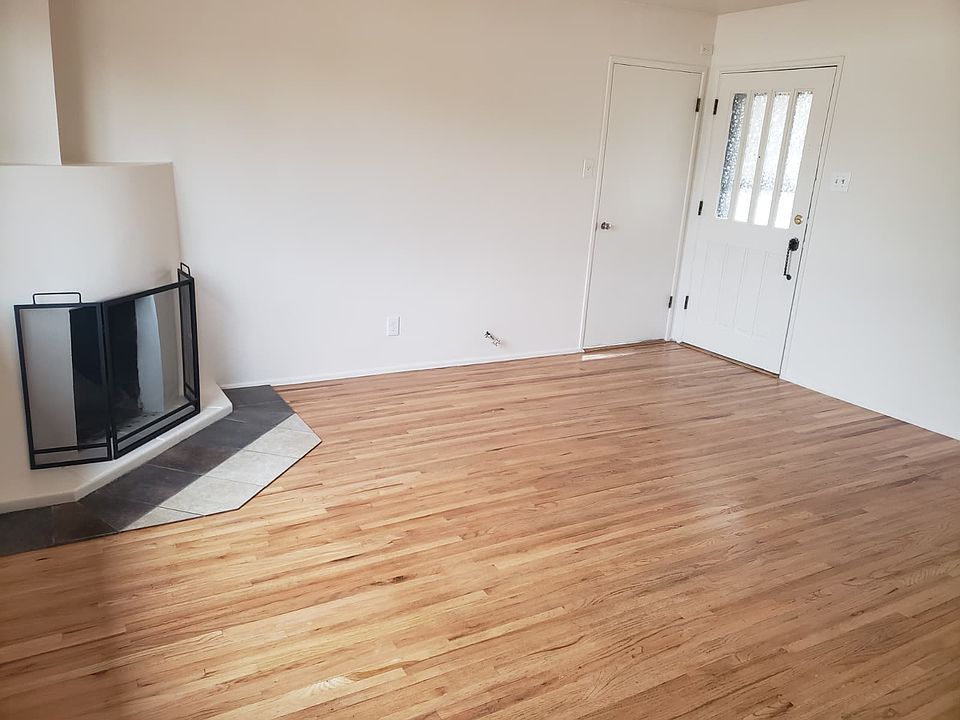 Red and White Oak Living Room Floor
Kiva Fireplace
