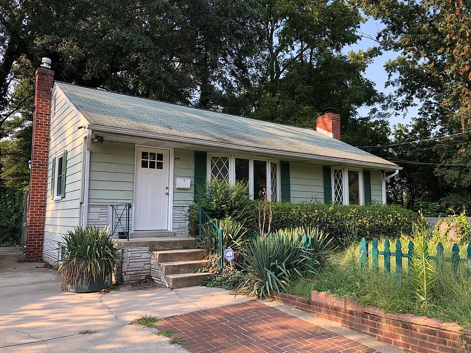 Front of house with with off street and on street parking.