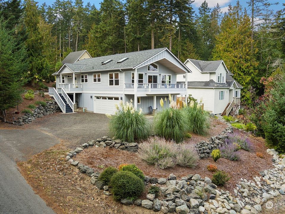 Corner lot, skylights face south for ideal natural light.>