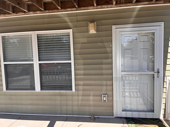 Front with new storm door