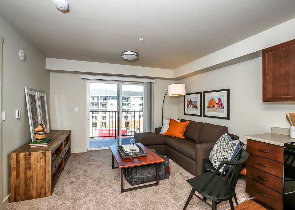 Living room with view of patio window