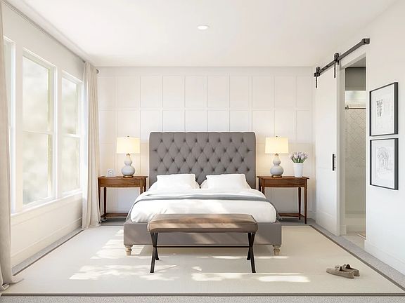 Primary suite with decorative feature wall