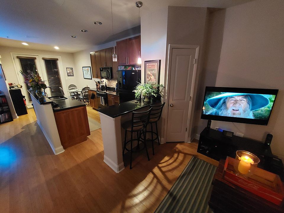 View from the front door, looking into the living room and kitchen area.