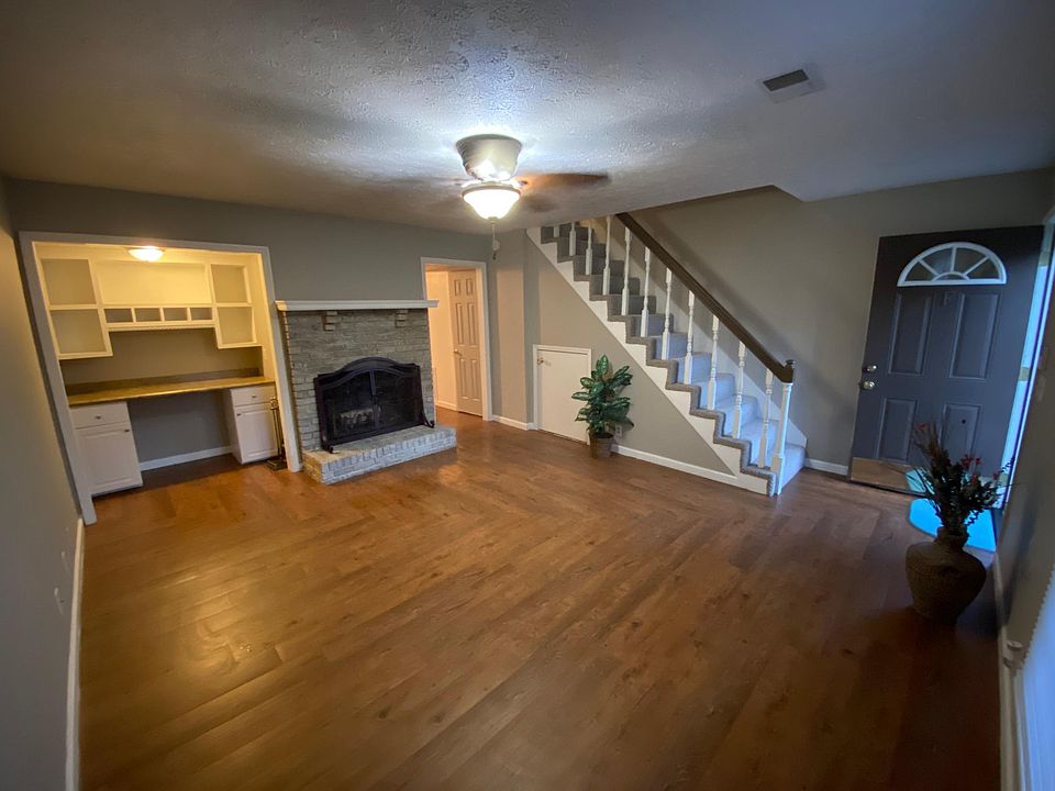 Beautiful Hardwood Floors, Office Area, and Fireplace greet you the moment you enter your new home.