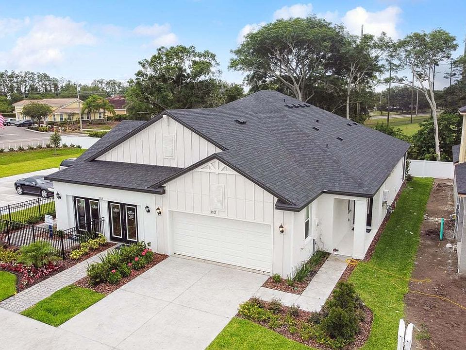 Sandpiper new construction luxury paired villa home plan in Sun City Center, FL at Fairway Pointe by