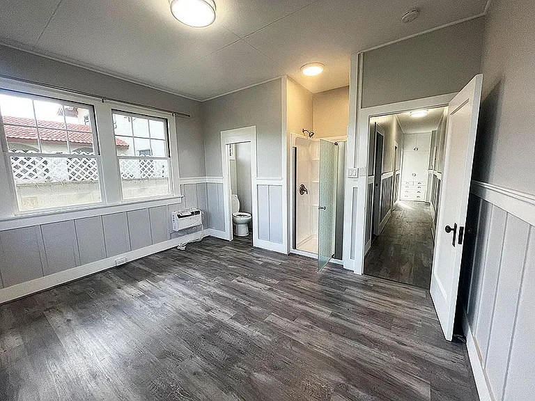 Master bedroom with Shower, Toilet, and AC unit!