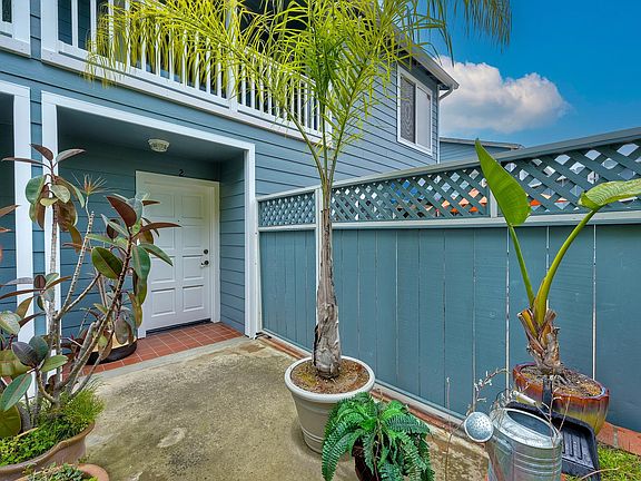 Front entrance and gate to patio
