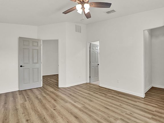 Primary bedroom with walk in closet