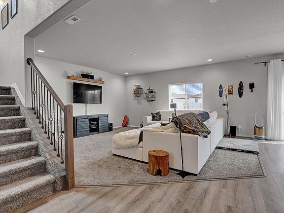 Spacious living room with recessed lighting
