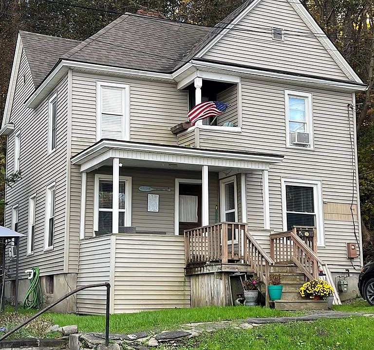 1st image of 106 E 8th St