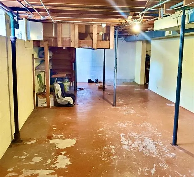 Downstairs unit's side of the basement (laundry hook ups as well). Upstairs unit's basement space is even larger.