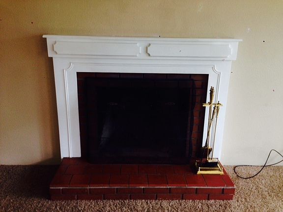 Living room wood burning fireplace