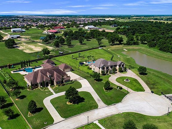 1.4 acres with plenty of privacy landscaping. Your backyard neighbors are 5 acres away!