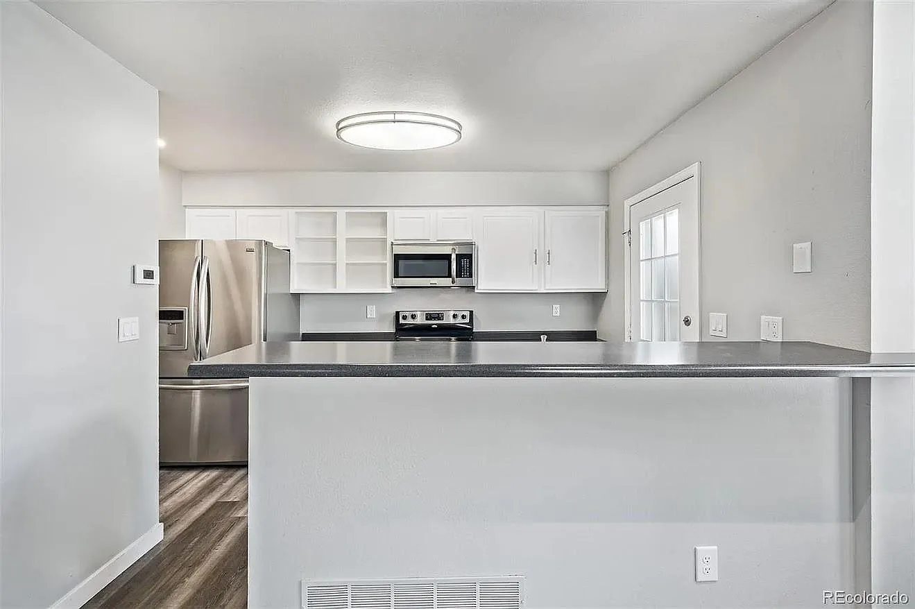 14251 E Dickinson Dr — Photo 2