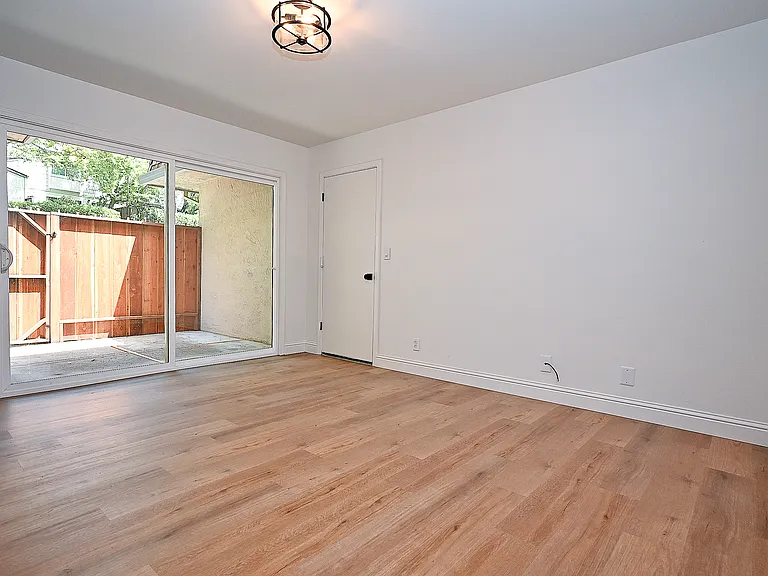 Den/living room to patio an garage