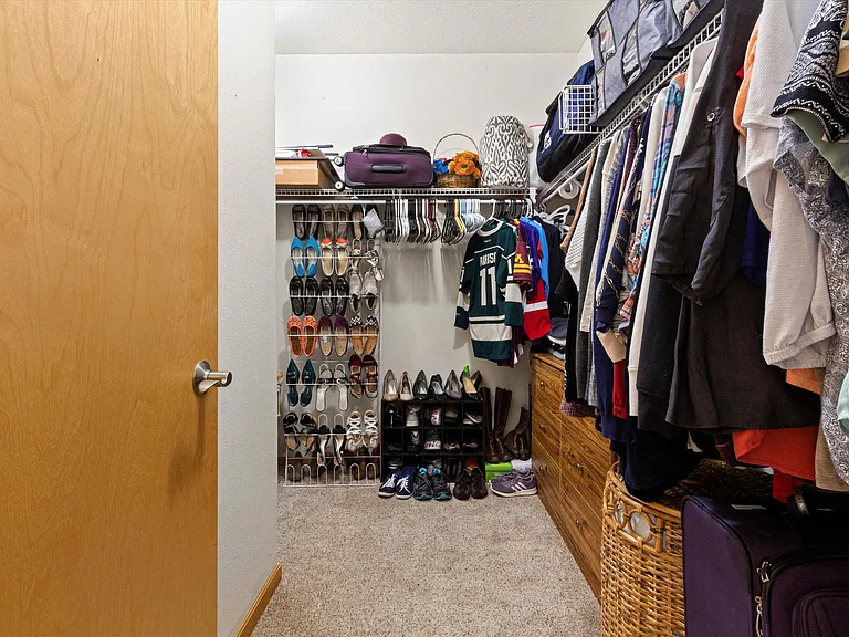 Master suite w/ shower stall and walk-in closet