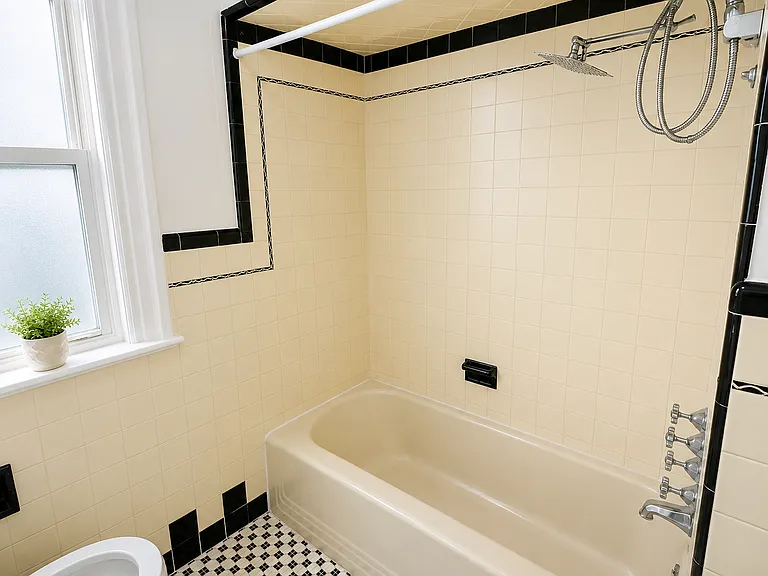 spacious bathroom with fancy rainfall showerhead