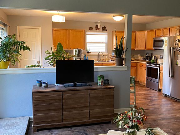 Open concept in living room and kitchen.