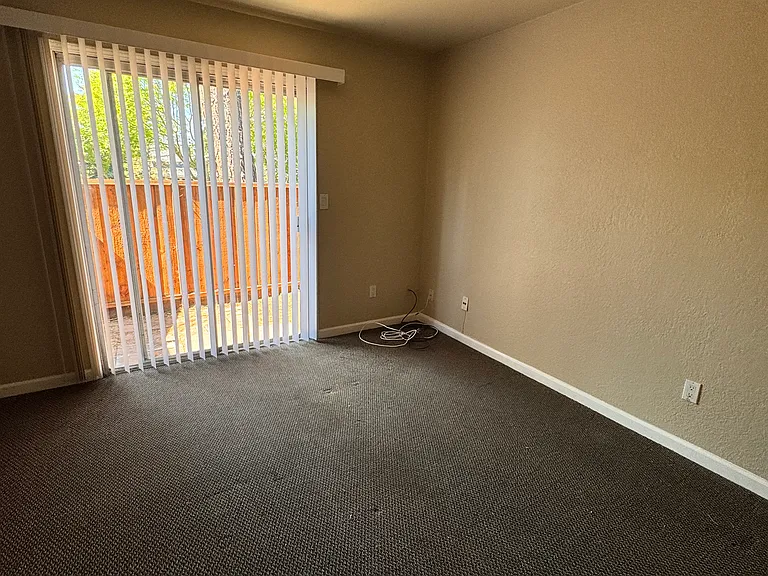 Master bedroom leading to the backyard patio