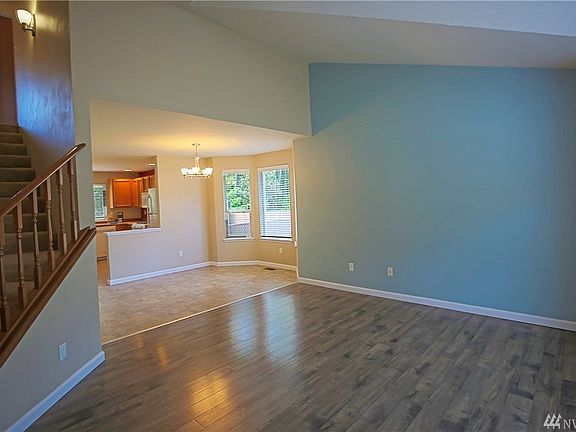 From living room into dining room and kitchen