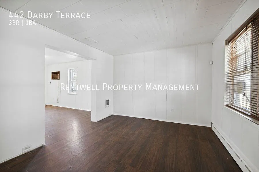 Updated 3-Bedroom End-Unit Home with Covered Porch & Patio — Photo 3