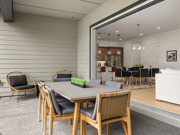 Seamless indoor-outdoor living from great room to the covered patio
