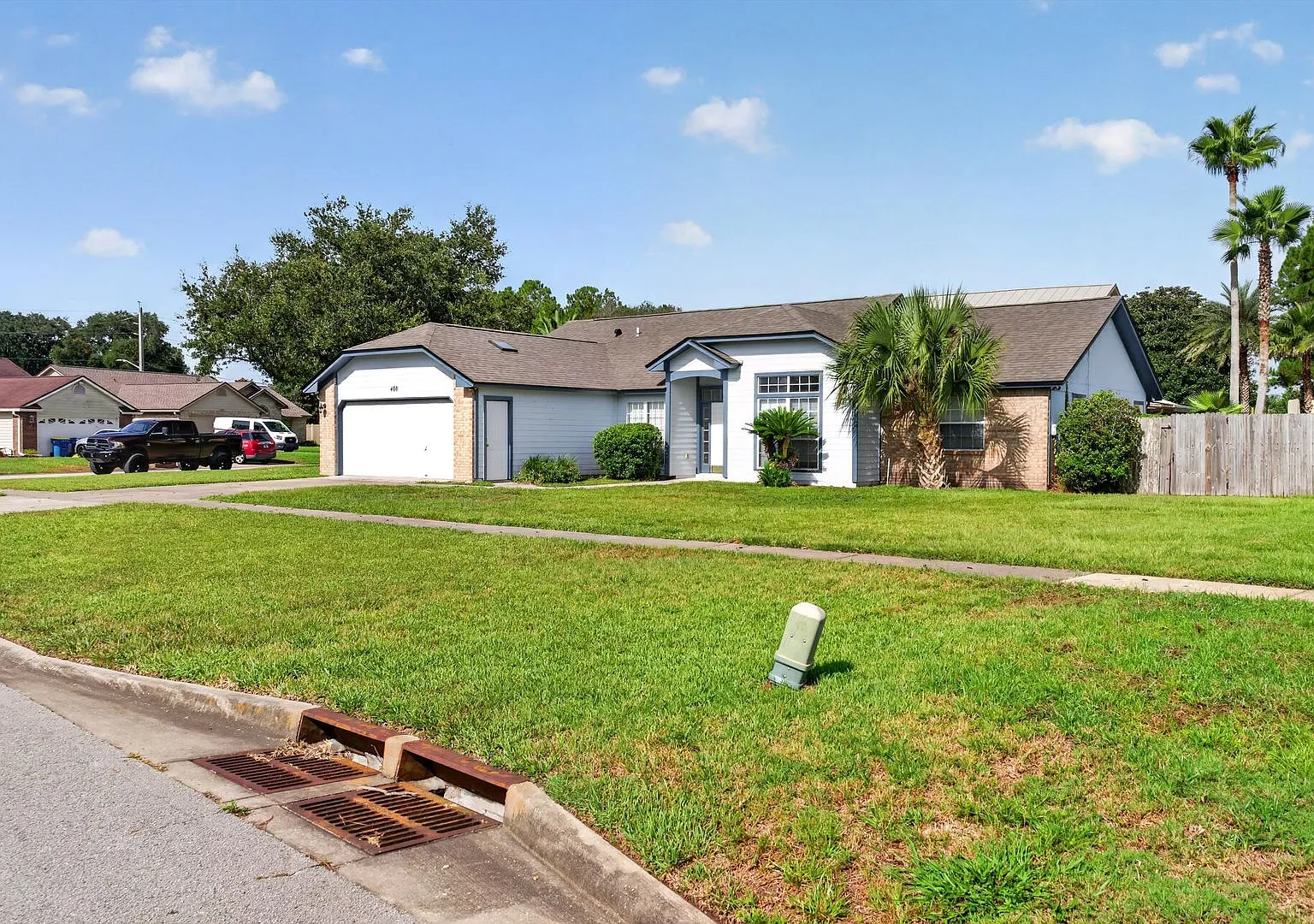 Large Home Has Fenced Backyard — Photo 3