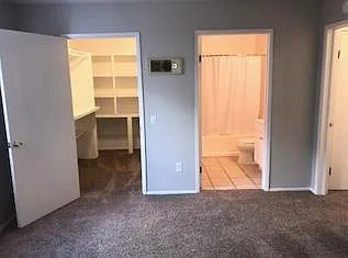 Large walk-in closet and bathroom.