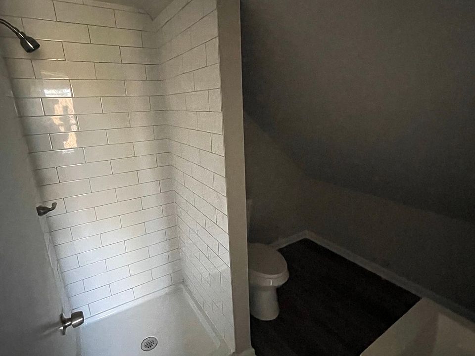 New bathroom with subway tile shower