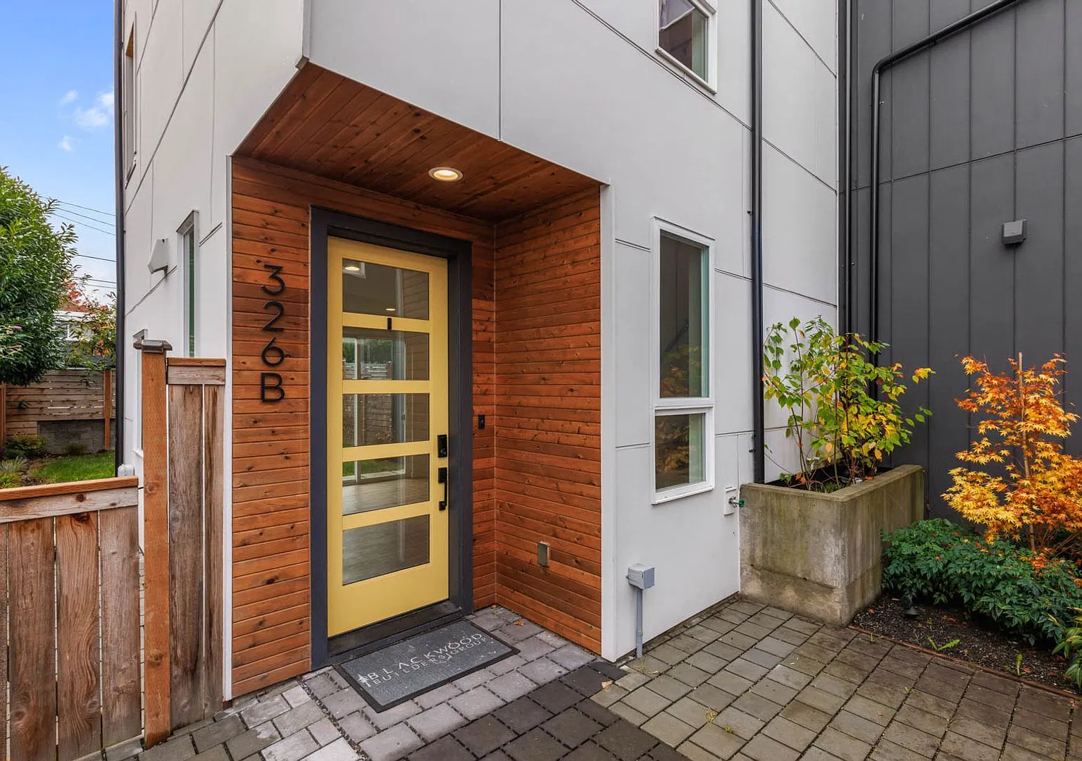 Modern Greenwood Living with a Private Yard, Rooftop Deck & Dedicated Parking! — Photo 4