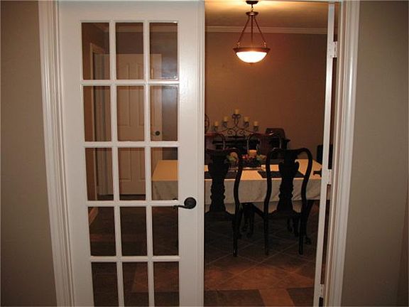 FRENCH DOORS LEADING INTO DINING