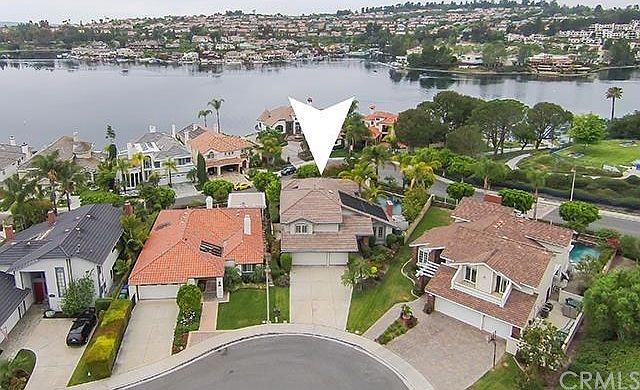 One street above Lake Mission Viejo with panoramic views.  Large pie lot at the end of the cul-de-sac