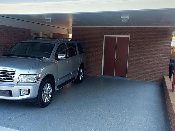 Large 2 vehicle carport with double door utility room