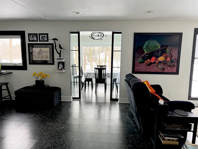 view from front entryway to living room and dining room