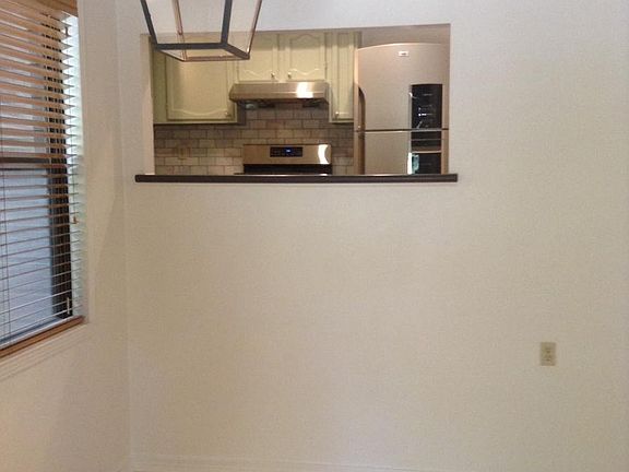 View of kitchen from dining room