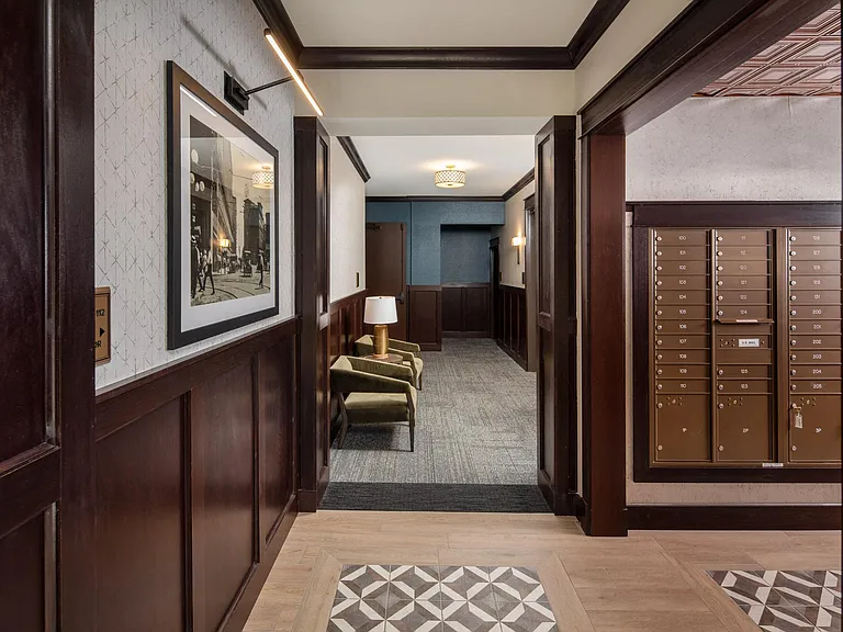 View of hallway and resident mailbox area at The Whitley.