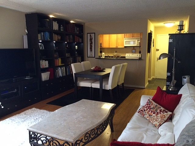 View from living room to kitchen and front door