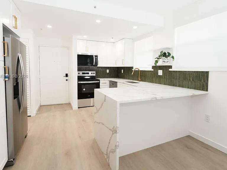 3052 SW 27th Ave #102 — Photo 1